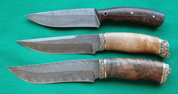 Ножи из ламината (основа-инструментальная сталь У8, накладки -дамасская сталь.)  http://korenok.ru/category/ekskljuzivnye-nozhi/
